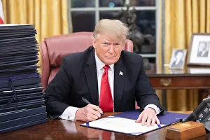Lcgr1902 Prints: President Donald Trump signing documents on Dec