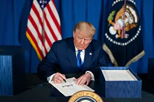 Budget Prints: President Donald Trump signs H