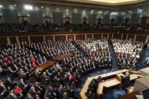 Party Prints: President Donald Trump speaks from the podium of the Capitol's House Chamber