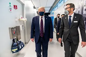 Prevention Prints: President Donald Trump wears a facemask with a Presidential seal during a tour of Fujifilm Diosynth Biotechnologies