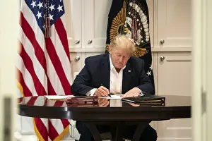 Sick Prints: President Donald Trump works in the Presidential Suite at Walter Reed National Military Medical Center in Bethesda