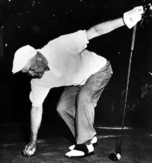 Golf Prints: President Dwight D. Eisenhower tees up as he prepares for a round of golf