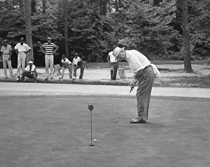 Putting Prints: President Dwight Eisenhower on a putting green of a golf course