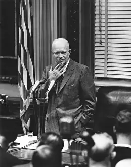 Newsmen Prints: President Eisenhower listening to a reporter's question at a press conference