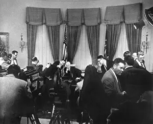 Newsmen Prints: President Eisenhower and newsmen before a Radio-TV address discussing his health after his Sept