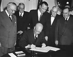 Dulles Prints: President Eisenhower signs House Joint Resolution 159