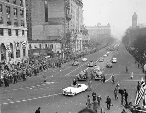Lcgr1412 Prints: President Eisenhower standing in an open car in the inaugural parade. Jan. 20, 1953
