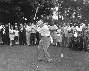 Lcgr1410 Prints: President Eisenhower teeing off on a golf course. Summer 1957. - (BSLOC_2014_14_34)