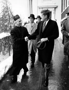Priest Prints: President-elect John F. Kennedy shakes hands with Father Richard J
