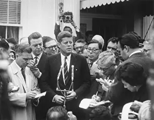 Transition Prints: President-elect John Kennedy speaks to reporters outside the White House after his meeting with President Dwight