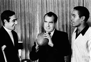 Football Players Prints: President-elect Richard Nixon was visited by All-Americans