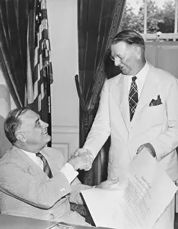 Knox Prints: President Franklin Roosevelt congratulates his new Navy Secretary, Republican Frank Knox