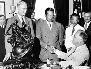Awards Prints: President Franklin Roosevelt shakes hands with Donald Douglas