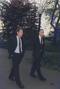 Fathers Prints: President George H.W. Bush walks on White House grounds with his son George W