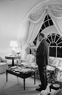 Sofa Prints: President Gerald Ford reading the newspaper in the living quarters of the White House
