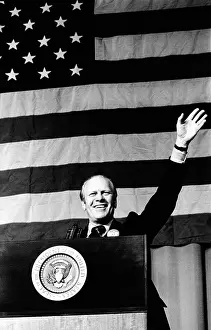 Indianapolis Prints: President Gerald Ford waves in front of a large American flag