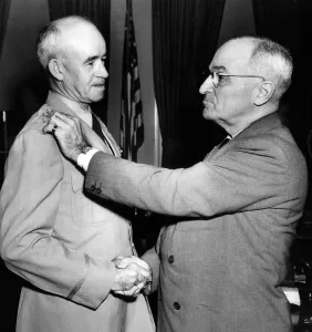 General Prints: President Harry Truman pins the silver insignia of General of the Army on General Omar Bradley