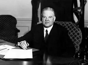 Images Dated 27th March 2007: President Herbert Hoover signs unemployment relief bills passed by congress