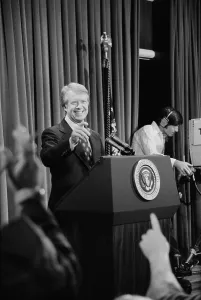 Raised Hands Prints: President Jimmy Carter taking a question at a press conference on Jan. 30 1977