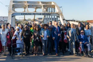 Democrats Prints: President Joe Biden crosses the Edmund Pettus Bridge with civil rights leaders commemorating the 58th anniversary of