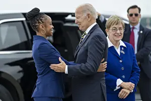 Limousine Prints: President Joe Biden is greeted by Congresswoman