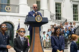 Speaking Prints: President Joe Biden is guarded by children dressed as his Secret Service agents