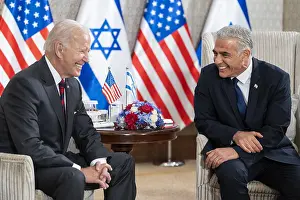 Informal Prints: President Joe Biden and Israeli Prime Minister Yair Lapid pose for photographers against a backdrop of American