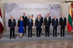 Defensive Prints: President Joe Biden poses with Bucharest Nine heads of state and Secretary General of NATO
