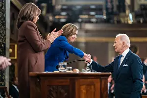 Applauding Prints: President Joe Biden shakes hands with House Speaker Nancy Pelosi after delivering his State of the Union address to