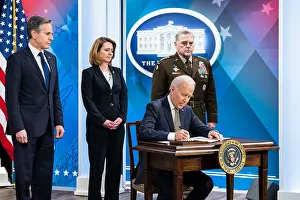 Katherine Prints: President Joe Biden signs a delegation of authority providing an additional $800 million in security assistance to