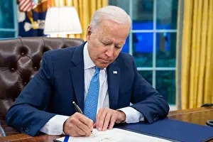70 80 Years Old Prints: President Joe Biden signs the Emergency Reparation Assistance for Returning Americans Act