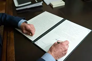 Document Prints: President Joe Biden signs an executive order promoting access to voting on March 6