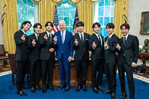 Philosophy Prints: President Joe Biden, snaps his fingers in coordination with BTS
