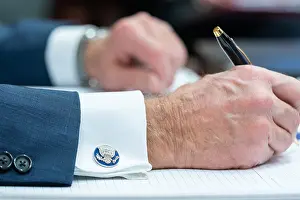 Epidemic Prints: President Joe Bidens hands as he takes notes during a G7 Leaders Virtual Meeting