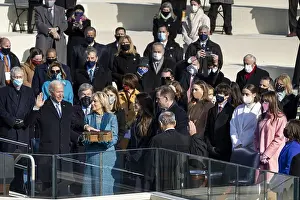 Ashley Prints: President Joseph R. Biden Jr. takes the presidential oath administered by Chief Justice John Roberts