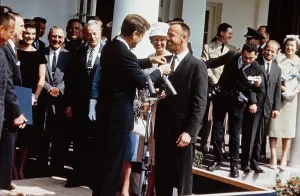 Shepard Prints: President Kennedy pins NASA's Distinguished Service Medal on the jacket of astronaut Alan Shepard in a Rose Garden