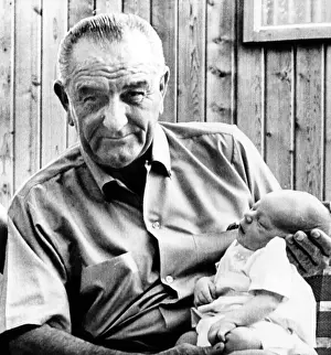 Baby Prints: President Lyndon B. Johnson holds grandson Patrick on his knee