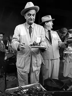 Food Prints: President Lyndon B. Johnson and Vice President Hubert Humphrey at a barbecue victory celebration at the LBJ ranch