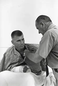 Proxy Wars Prints: President Lyndon Johnson awards a medal to a wounded U