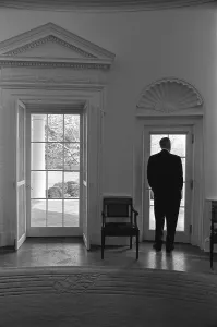 Body Language Prints: President Lyndon Johnson looking out doorway of the Oval Office. Jan. 24, 1966