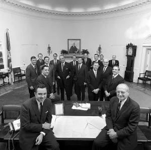 Staff Prints: President Lyndon Johnson posing with his staff on Jan 10