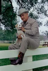 Casual Prints: President Lyndon Johnson posing with Yuki at the LBJ Ranch