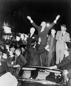 Campaigns Prints: President Lyndon Johnson and Robert Kennedy standing on back of car
