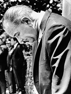 Posture Prints: President Lyndon Johnson stands with head lowered as he awaits the arrival of President Hastings Kamuzu Banda of Malawi