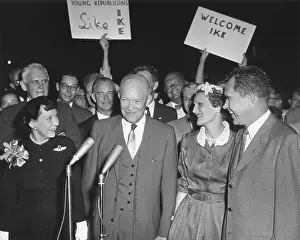 Microphones Prints: President and Mamie Eisenhower are greeted by Vice President and Pat Nixon