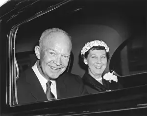 Couples Portraits Prints: President and Mamie Eisenhower smiling from a limousine