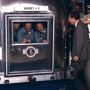 Neil Prints: President Nixon personally welcomes the Apollo 11 astronauts then in Mobile Quarantine Facility aboard the USS Hornet
