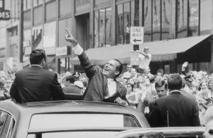 Campaigns Prints: President Nixon pointing at the crowd from the roof of his car during a motorcade