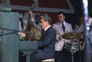 November Prints: President Nixon singing and playing the Piano at the dedication of the New Grand Ole Opry House