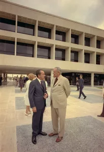 Austin Prints: President Nixon standing with Lyndon Johnson outside the LBJ Library in Austin Texas